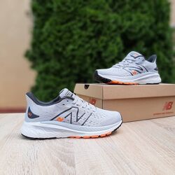 Кросівки жіночі New Balance 860 сірі з оранжевим