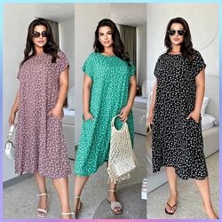 48-50,52-54,56-58 Сукня вільного крою, короткий рукав, з кишенями.