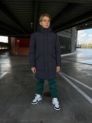 Стильний подовжений пуховик на підлітка