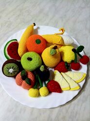 Вязані розвиваючі іграшки фрукти 