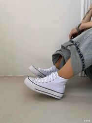 Кеди завищені білі