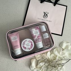 Догляд за тілом у зручній прозорій косметичці Pomegranate  Lotus