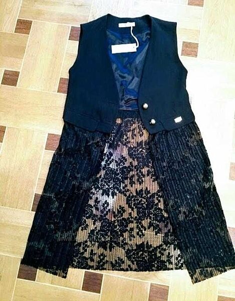 Красивый жилет итальянской фирмы Roberta Biagi.