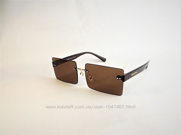 Женские солнцезащитные очки Miu Miu коричневые