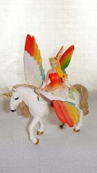 Игрушки Фигурка Schleich Bayala Фея Эльф Наездница на радужном коне