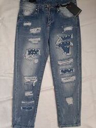 Женские рваные джинсы 