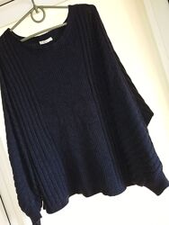 Мьякенький светр синього кольору 12-14 розмір