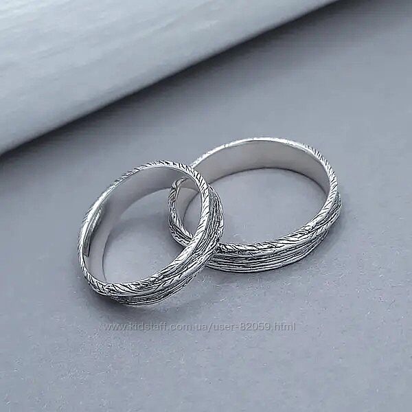 Срібна пара каблучок Орбіта