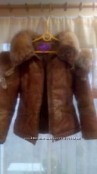 качественная красива зимняя курточка пуховик натуральный мех.