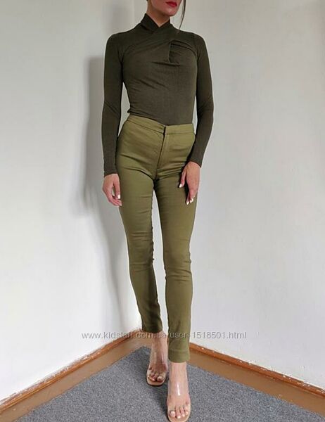 Стрейчеві брюки кольору хакі H&M