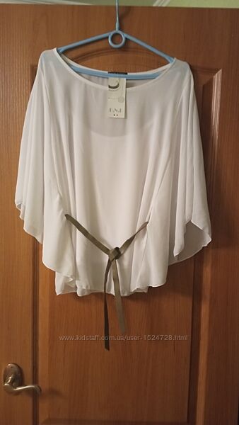 Біла блузка під поясок