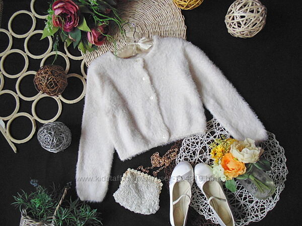 Шикарне пухнасте болеро H&M