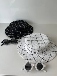 Твідовий капелюх Chanel в наявності білий, чорний.