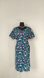 Женский трикотажный халат на молнии с карманами и поясом. Размер 46-68