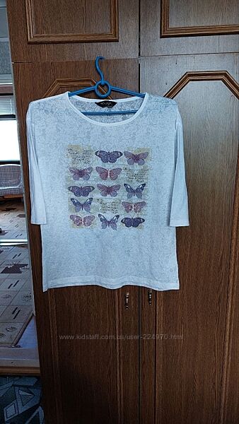 Невагома блузка з метеликами 