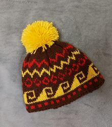 Яркая шапка из смеси кашемира и мериноса.