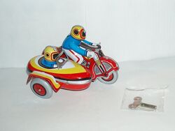 Новая коллекционная заводная игрушка мотоциклист ретро стиль жесть