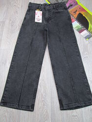 Темно-серые и черные джинсы палаццо для девочки. 134р. Турция.