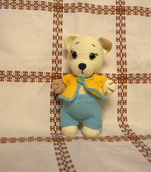 Іграшка песик в одежі.