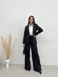 Стильний жіночий костюм  піджак і брюки палаццо