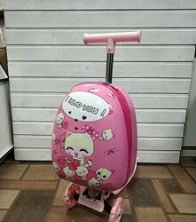 Чемодан самокат детский на 3-х колесах розовый Кити для девочки