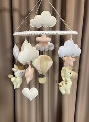 Мобіль в дитяче ліжечко